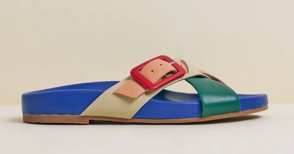 Colorful sandal with a red buckle close-up