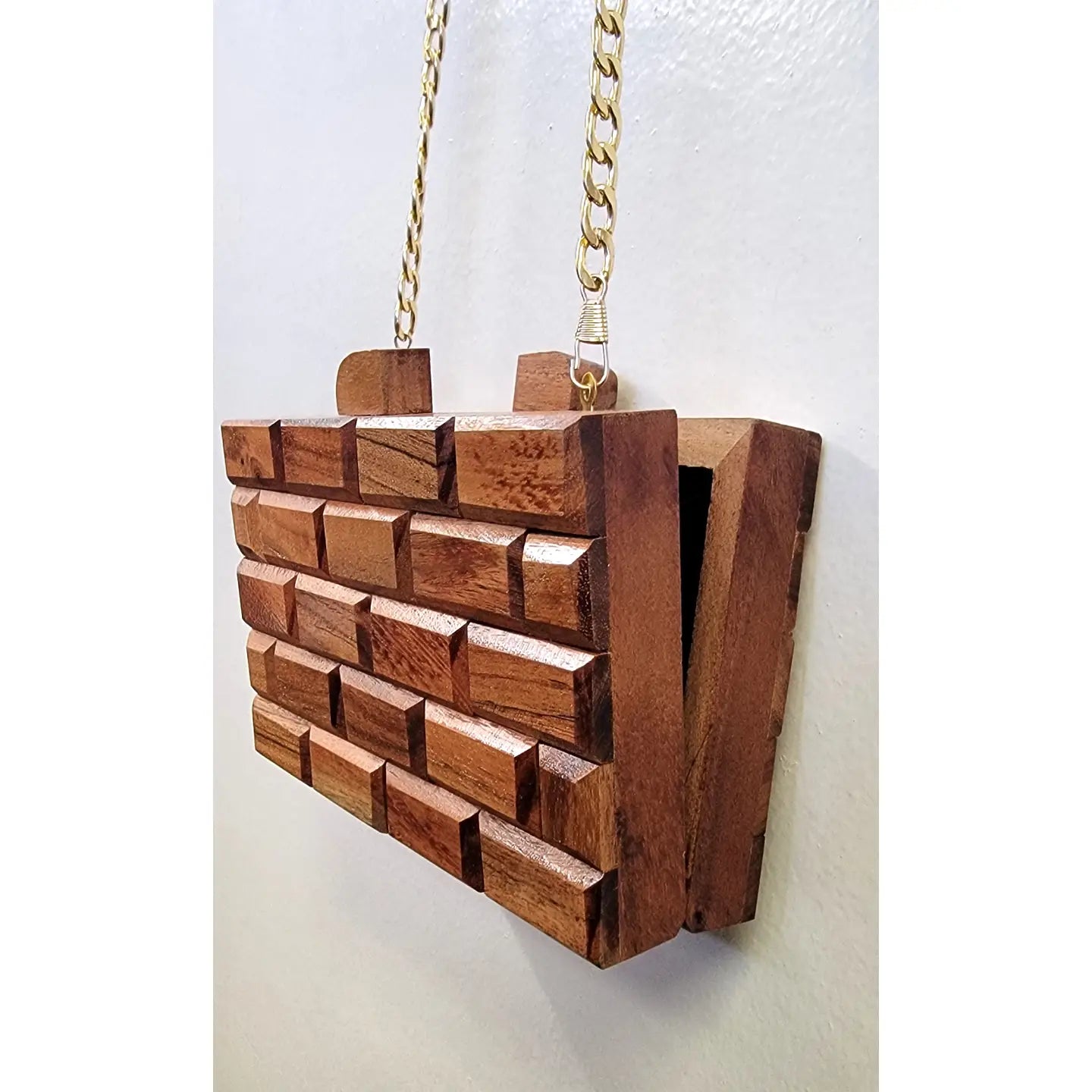 Wooden handbag with a gold chain strap side