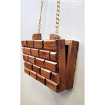 Wooden handbag with a gold chain strap side
