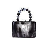 Black marble handbag with beaded handle