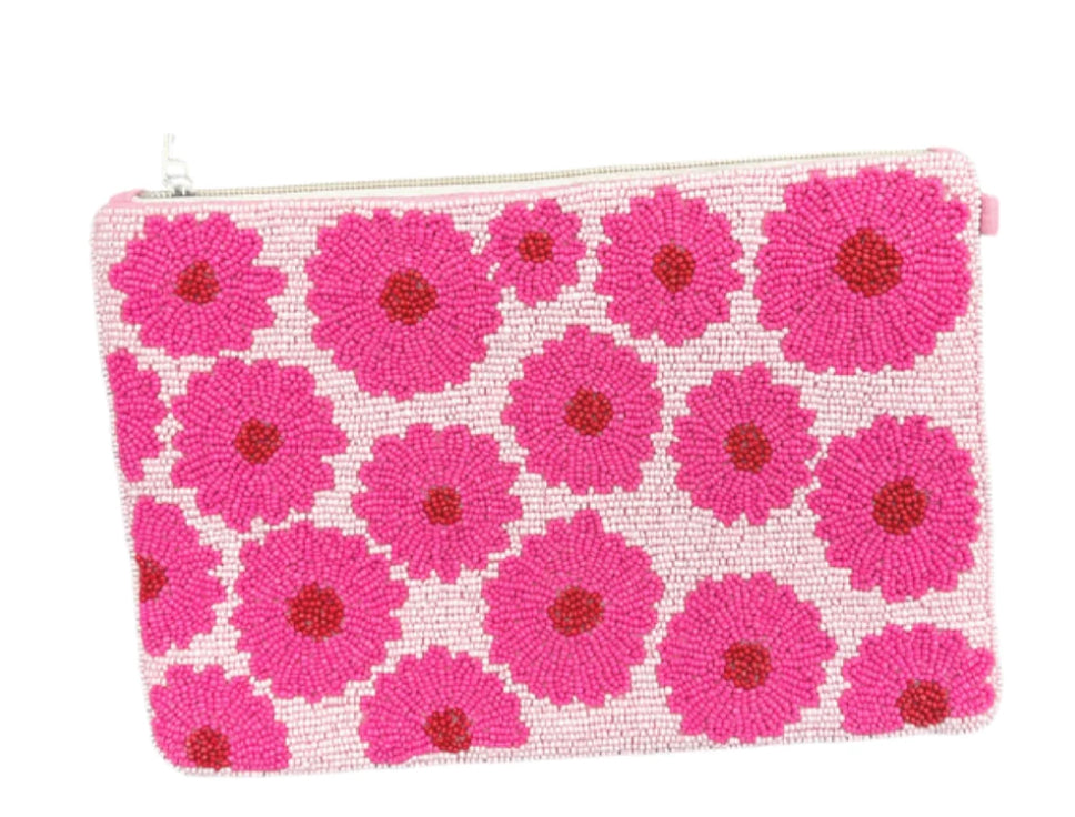 Colorful beaded pouch with pink floral pattern close-up