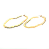 oval squiggle half crystal hoop earrings feature 18K gold finish with black diamond crystals detail. Handmade in Brooklyn.