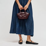 Urban Expressions Selena Embossed Woven Crossbody Bag