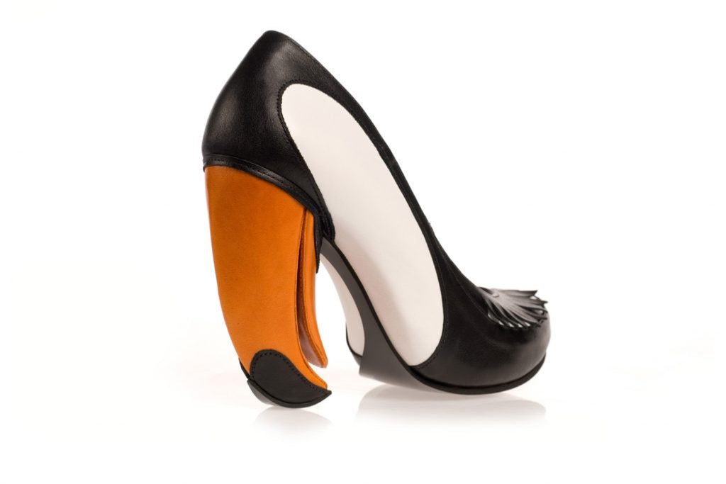 Black white and orange toucan tropical bird inspired high heel shoe with unique beak shaped heel. Hand crafted and limited edition.