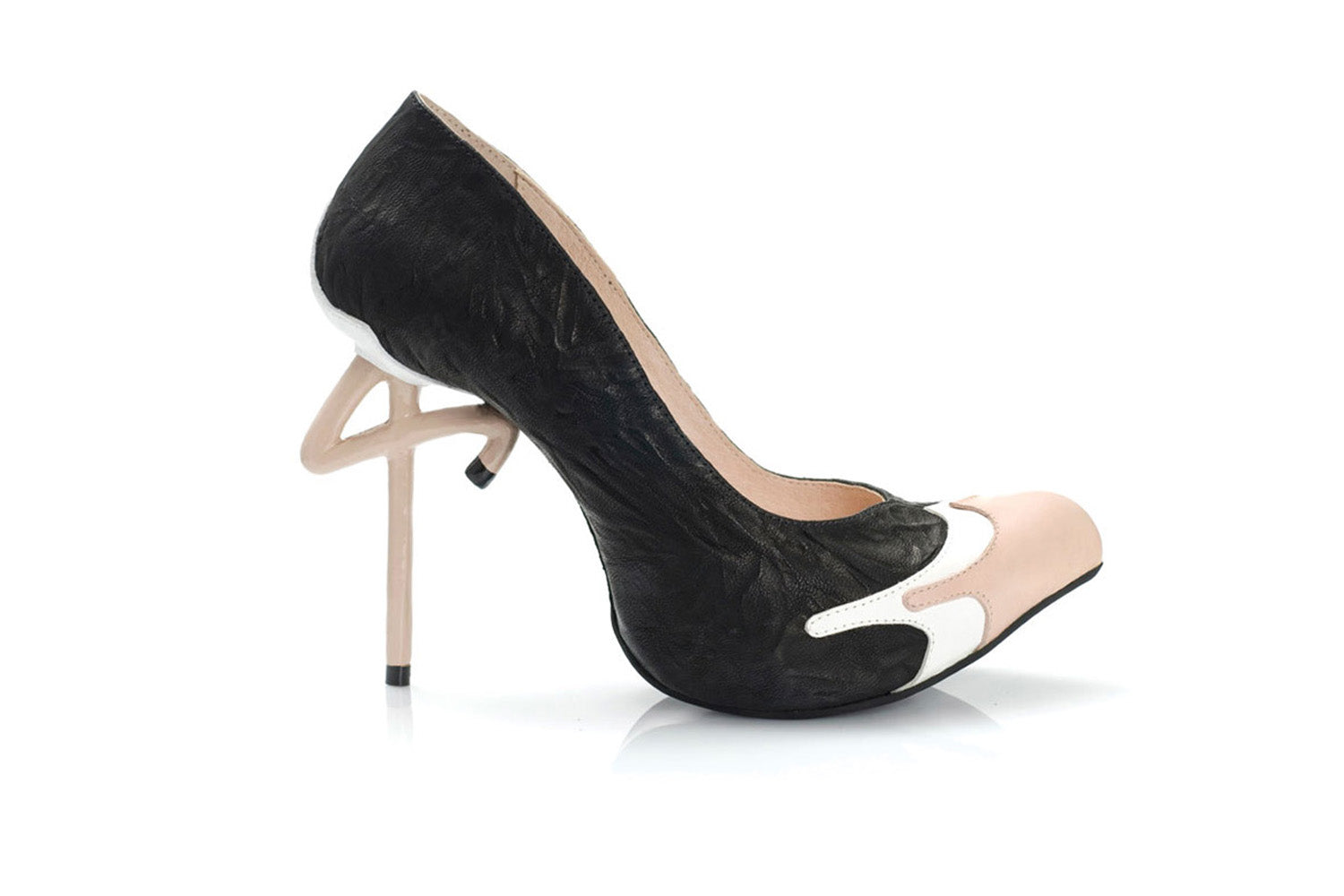 Handmade ostrich inspired high heel shoe in black and beige with unique stiletto heel. 