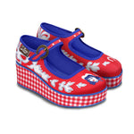 A pair of red and blue checkered Mary Jane platform shoes with a printed fabric upper and a customizable buckle strap, featuring a non-marking rubber sole.