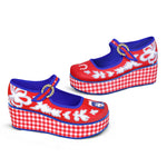 A pair of red and blue checkered Mary Jane platform shoes with a printed fabric upper and a customizable buckle strap, featuring a non-marking rubber sole inside