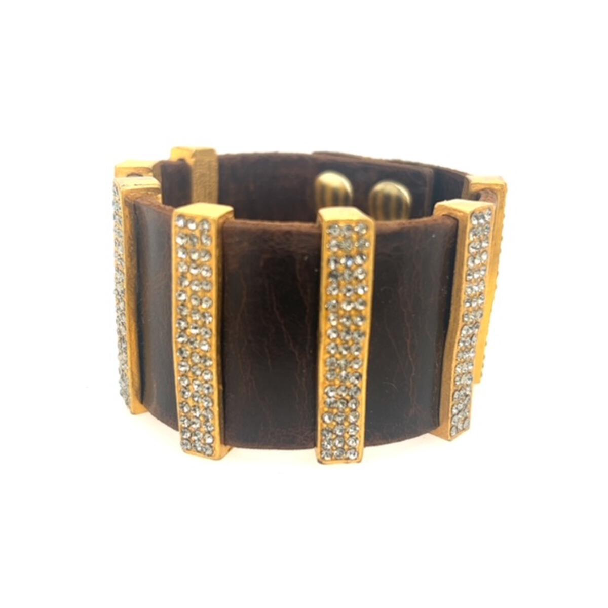 wide band bracelet features double sided black diamond crystal accented 18K gold plated bars on a vintage brown leather brand. Handmade in New York.