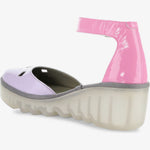 Pink and purple sandal with a transparent sole and pink ankle strap inside view