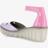 Pink and purple sandal with a transparent sole and pink ankle strap inside view
