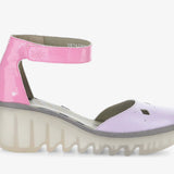 Pink and purple sandal with a transparent sole and pink ankle strap close-up