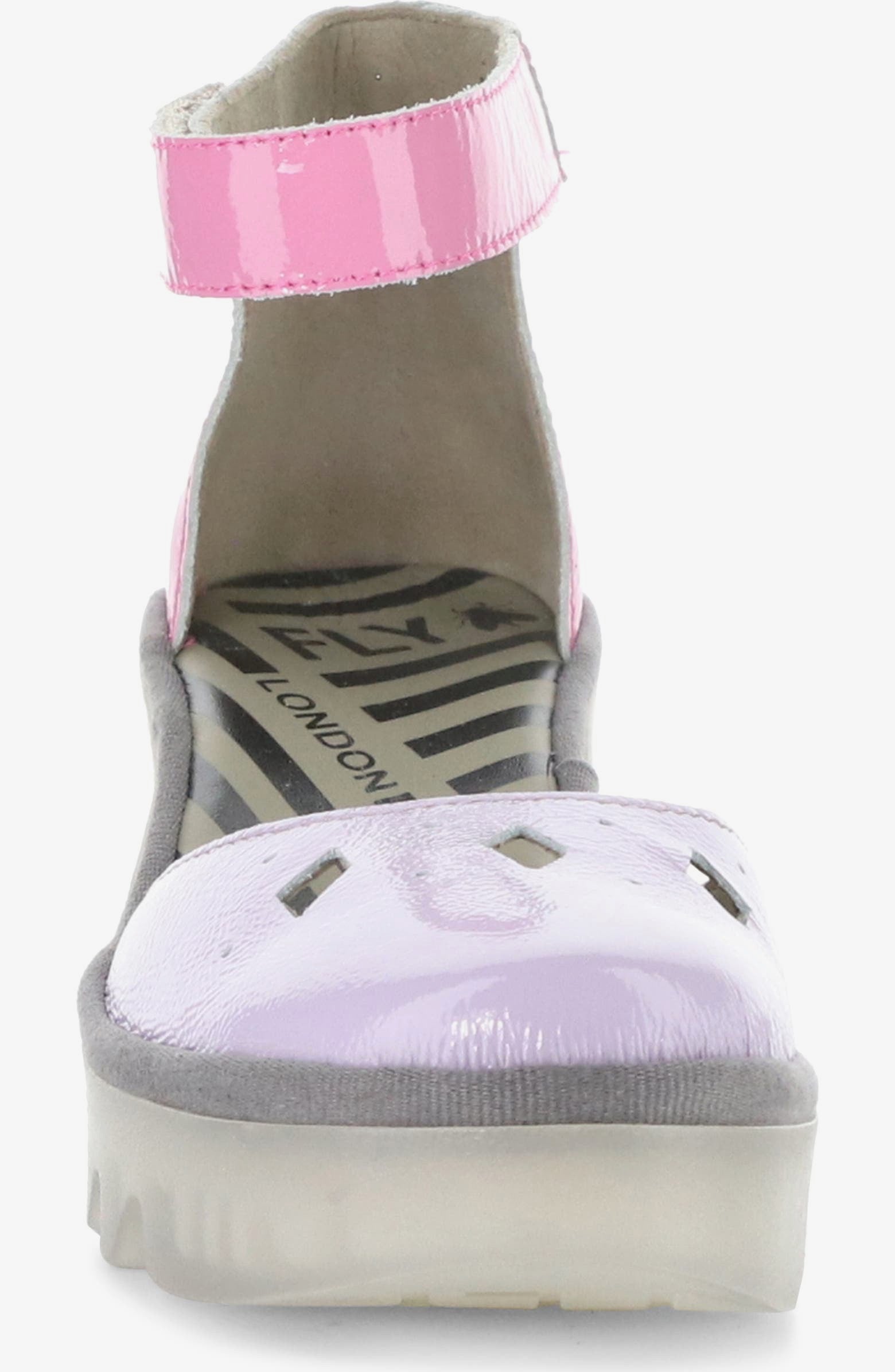 Pink and purple sandal with a transparent sole and pink ankle strap toe box