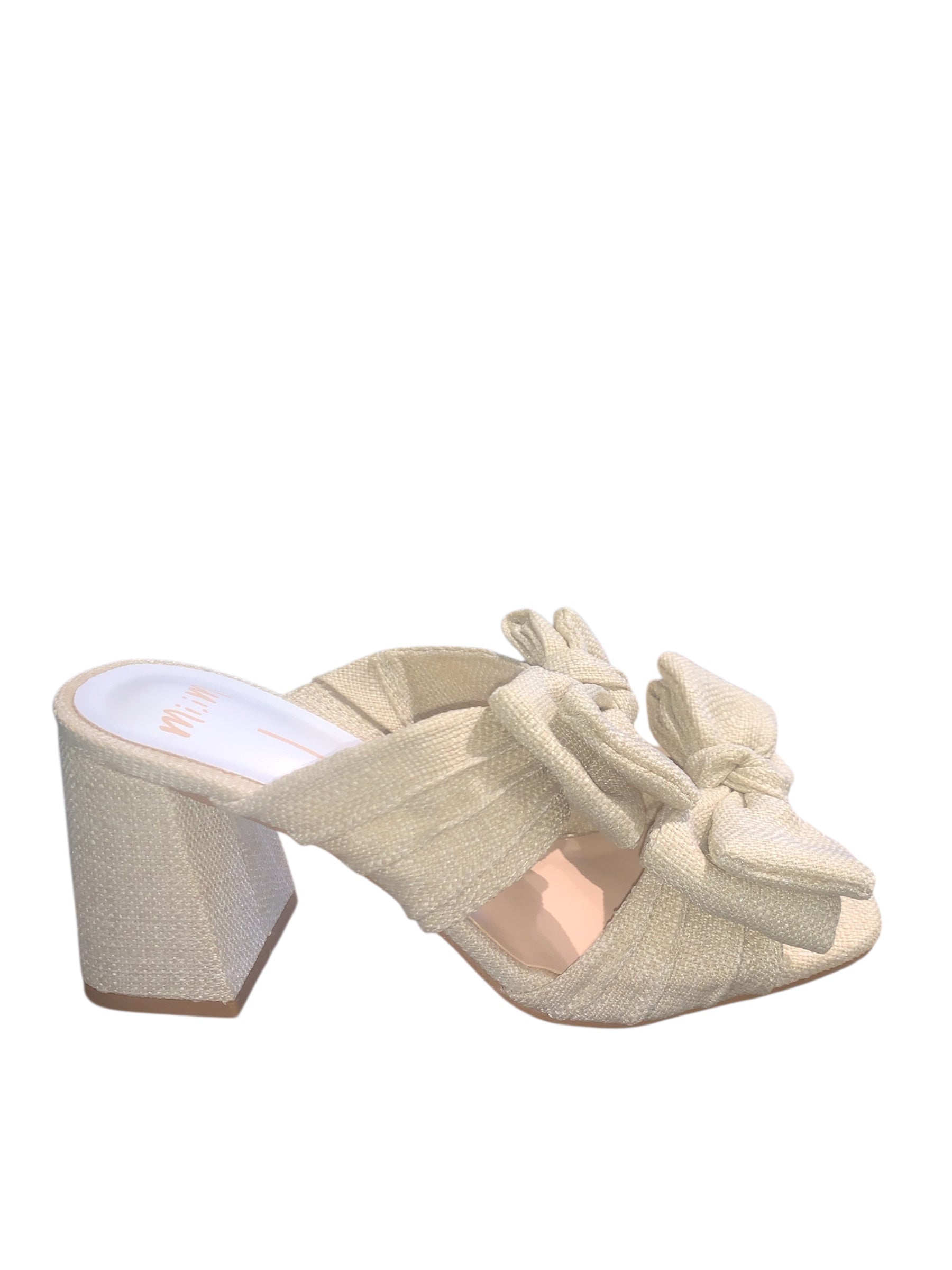 Rustic beige heel with a bow close-up