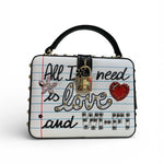 Handbag with decorative text and heart design