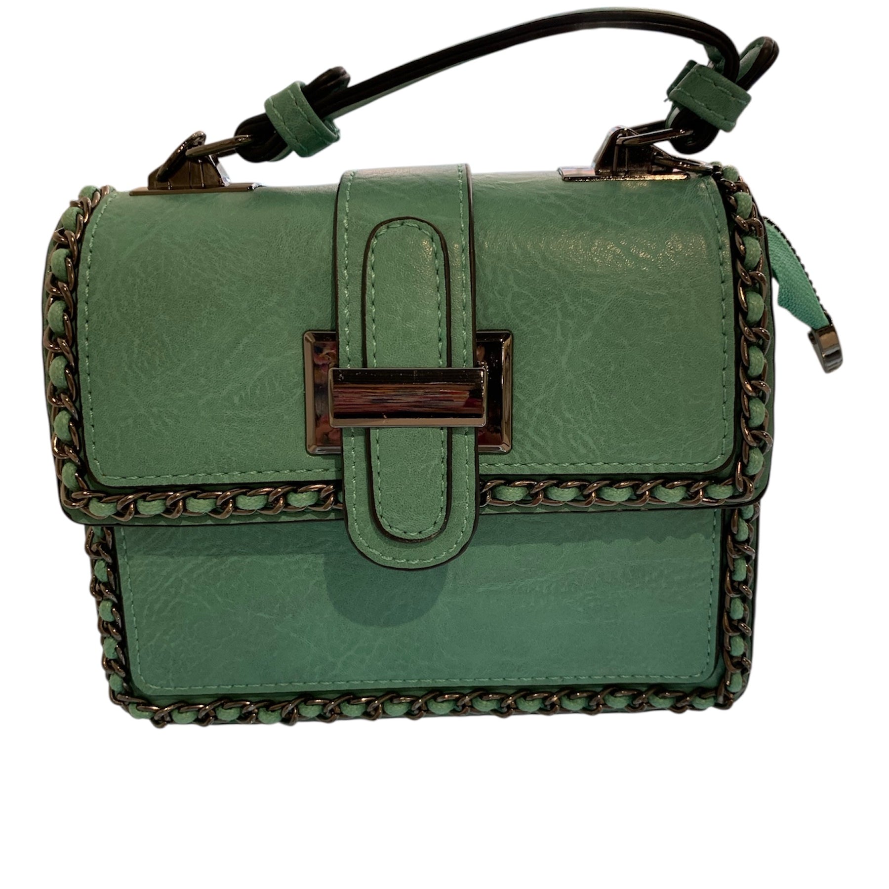 Green handbag with braided details closeup