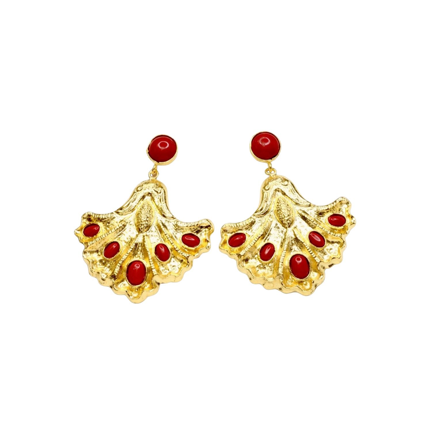 Gold colored earrings with red stone accents on a white background