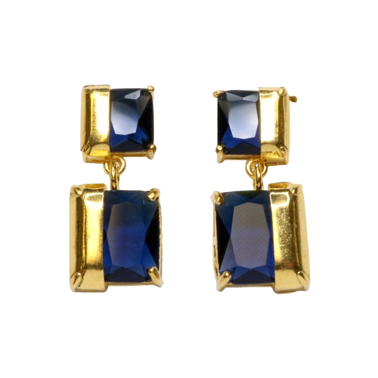 Gold colored earrings with square blue stones on a white background