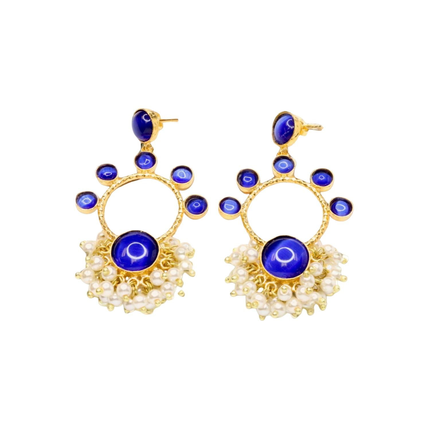 Gold hoop earrings with blue circular stones and pearl-like accents on a white background