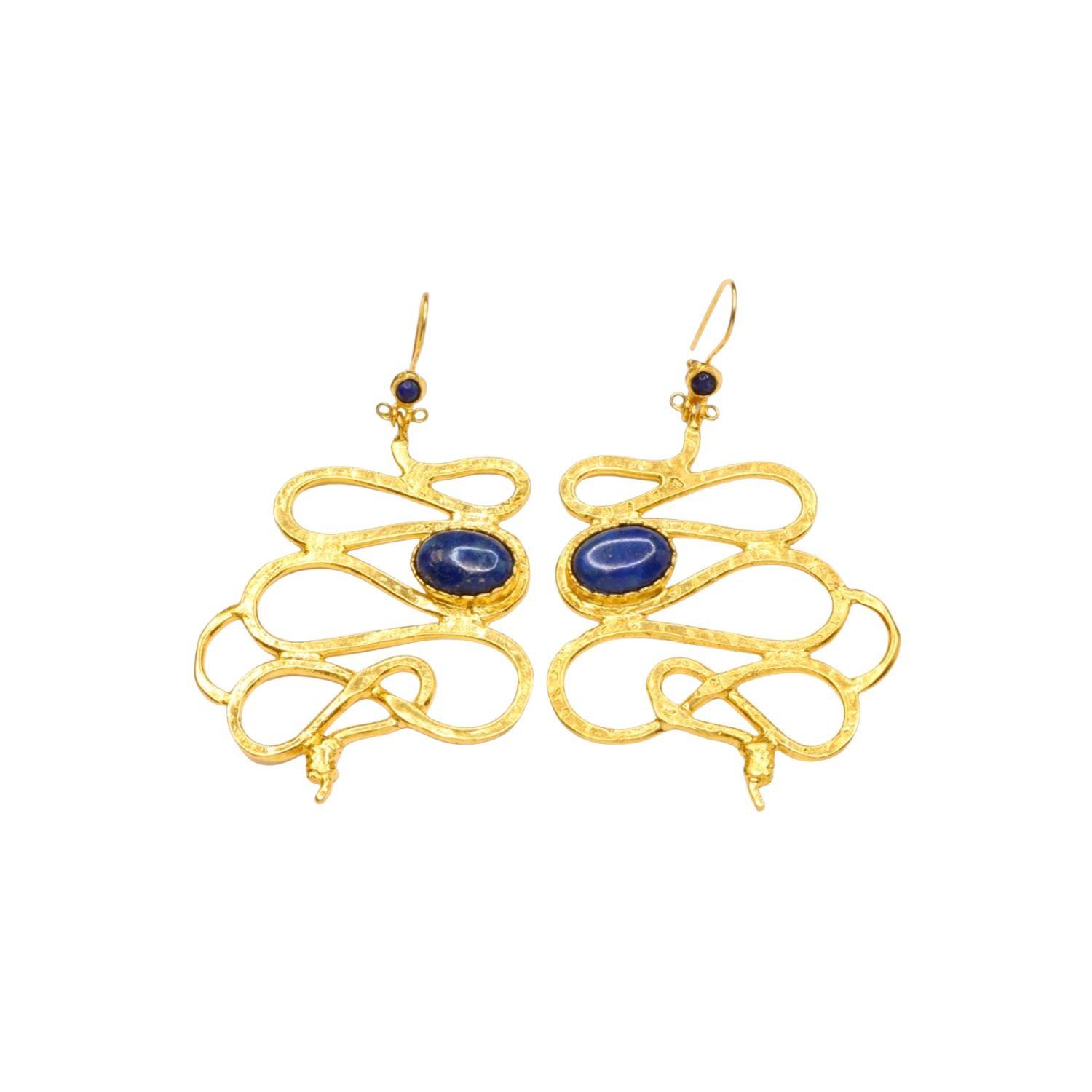 Gold colored snake shaped earrings with blue stones on a white background