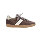 Brown sneaker with white strip detail and animal print ribbon shoe laces