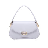 Lavender handbag with gold accents 