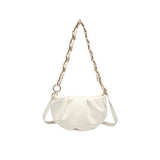 White handbag with a chain strap 