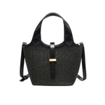 Black woven handbag with leather straps 