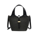 Black woven handbag with leather straps 