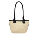 Beige straw handbag with black accents and black shoulder strap 