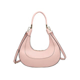 Pink handbag with a hand strap and shoulder strap