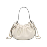 Cream handbag with chain detail and hand strap