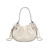 Cream handbag with chain detail and hand strap