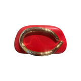 Red clutch with gold metal band