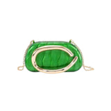 Green clutch bag with gold chain 