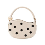 Off-white handbag with black polka dots and pearl handle