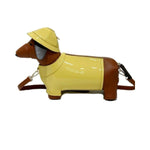 Dog-shaped bag with a yellow body and brown ears and tail 