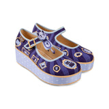 Pair of purple mary jane platform shoes with cat designs, and across the foot buckles on a white background side profile