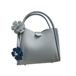 Gray handbag with floral details 