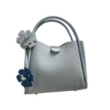 Gray handbag with floral details 