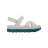 White platform sandal with a blue-green sole and multiple straps