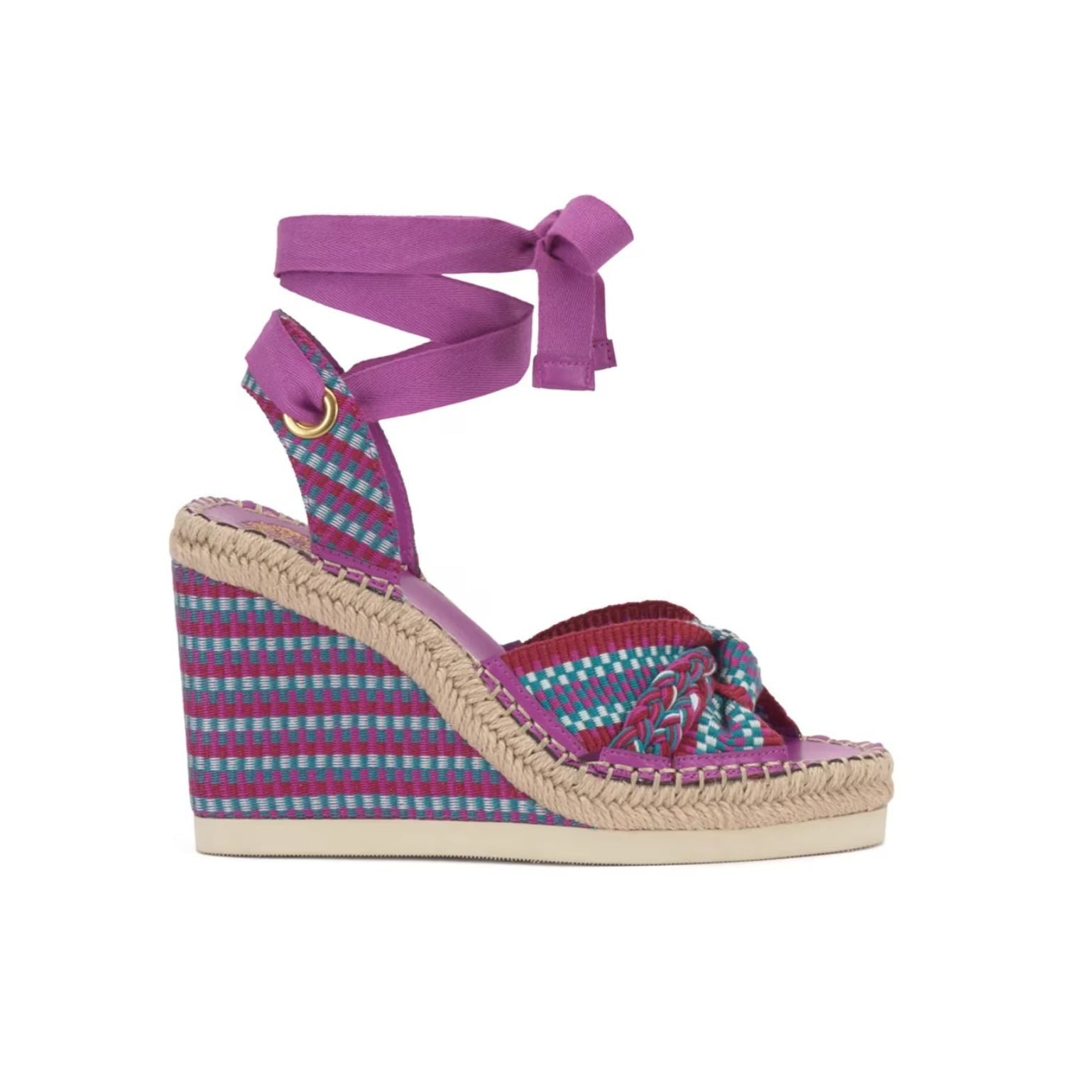 Wedge sandal with purple strap and multicolored fabric on a white background