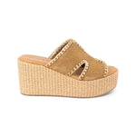 Beige wedge sandal with woven sole close-up