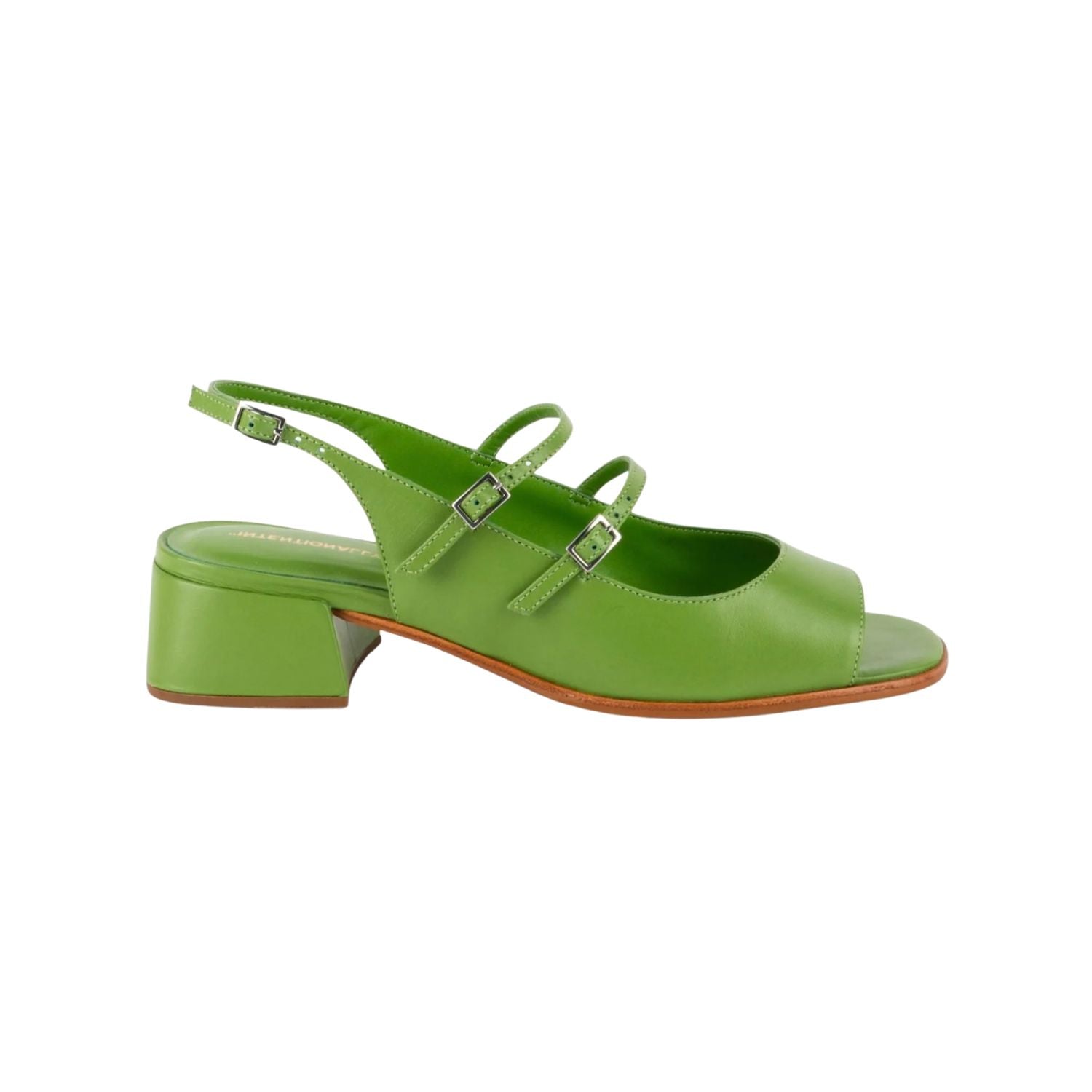 Green sandal with a block heel on a white background