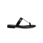Black sandal with a gold chain with small heel