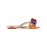 Colorful sandal with gold thong strap and butterfly embellishments