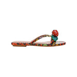 Colorful sandal with a decorative strawberry on toe strap