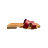 Red sandal with beige sole
