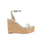 Beige wedge sandal with gold metallic straps and buckle closure