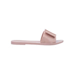 Light pink flat sandal with bow embellishment