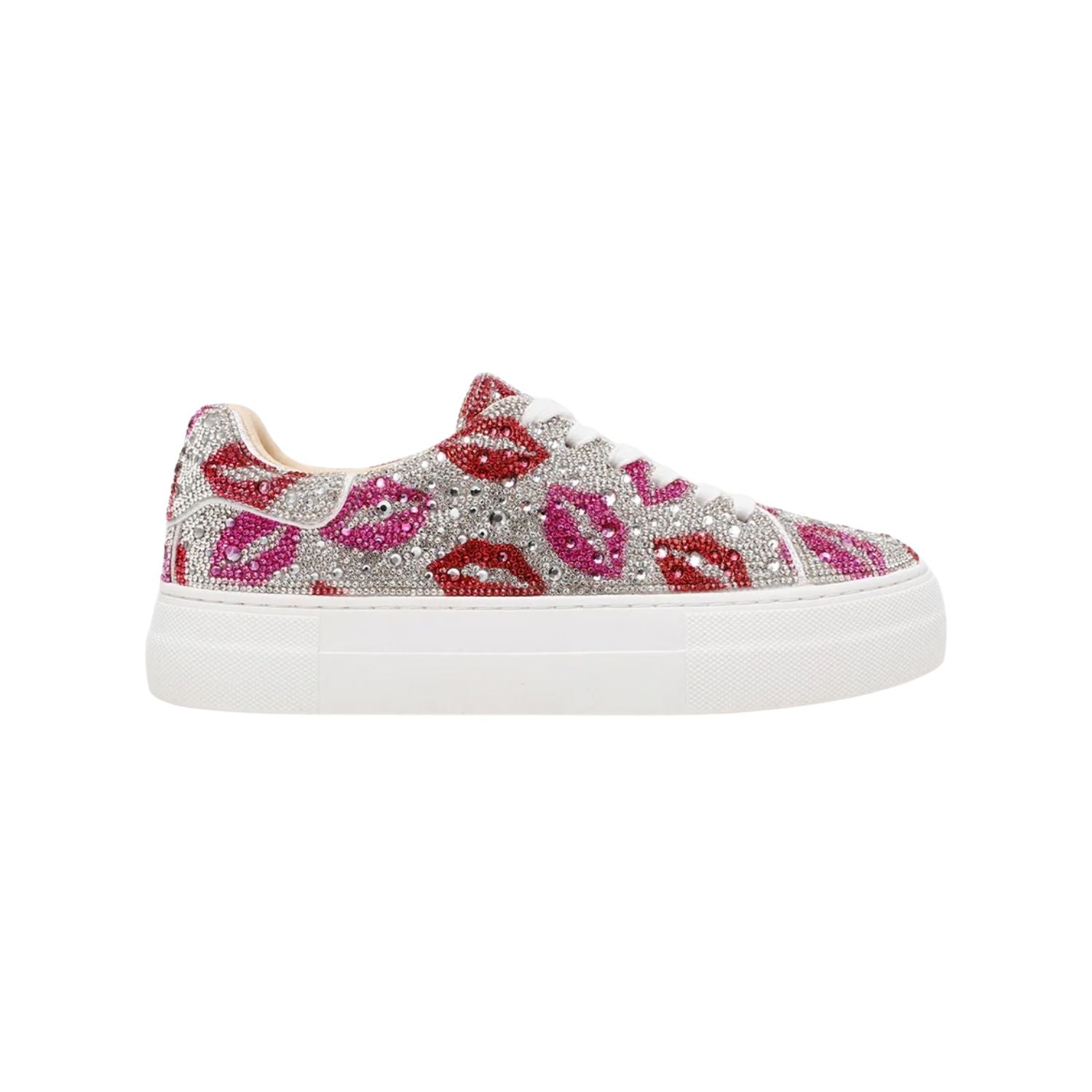 Sneaker with pink and red lip print design on a white background